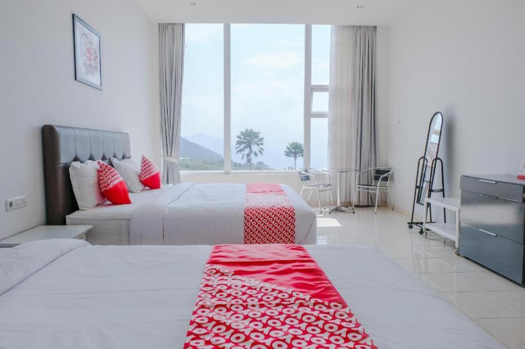 Oyo 1194 Villa Bukit Panderman Residence Бату Экстерьер фото